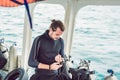 Young diver preparing an underwater compass for diving Royalty Free Stock Photo