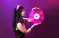 Dj headphone equipment disco girl party retro vintage ultraviolet mixer young woman vinyl glamor valentine`s day plastic pink Royalty Free Stock Photo