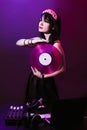 Dj headphone equipment disco girl party retro vintage ultraviolet mixer young woman vinyl glamor valentine`s day plastic pink