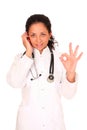 Young doctor calling by phone Royalty Free Stock Photo