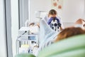 Young doctor doing gynecological examination of female patient Royalty Free Stock Photo