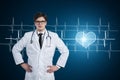 Young doctor, heart and cardiogram Royalty Free Stock Photo