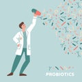 Young doctor holding Pharmacy pill with probiotics. Concept of dysbacteriosis, intestinal microflora, microbiome