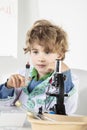 Young doctor holds a syringe in his hand filled with vaccine