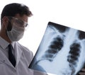 Young doctor looking at x-ray images isolated on white Royalty Free Stock Photo