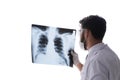 The young doctor looking at x-ray images isolated on white Royalty Free Stock Photo