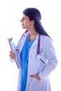 Young doctor or medic with clipboard and stethoscope standing on white background Royalty Free Stock Photo