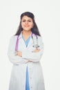 Young doctor or medic with clipboard and stethoscope standing on white background Royalty Free Stock Photo