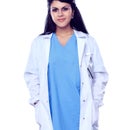 Young doctor or medic with clipboard and stethoscope standing on white background Royalty Free Stock Photo