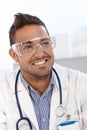 Young doctor in safety googles