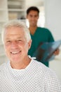 Young doctor with senior patient Royalty Free Stock Photo