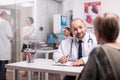 Young doctor and senior patient Royalty Free Stock Photo