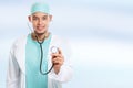 Young doctor with stethoscope heart breathing checkup check illness disease man copyspace copy space Royalty Free Stock Photo