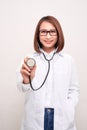 Young doctor woman holding stethoscope isolated on white background Royalty Free Stock Photo