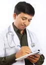 Young Doctor Writing Prescription Royalty Free Stock Photo