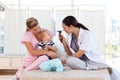 Young doctors attending to a baby Royalty Free Stock Photo