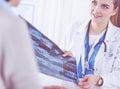 Young doctors studying X-ray images in clinic Royalty Free Stock Photo