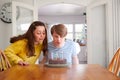 Young Downs Syndrome Couple Celebrating Birthday At Home With Cake Royalty Free Stock Photo