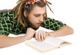 Young dreadlock man reading book isolated Royalty Free Stock Photo