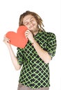 Young dreadlock man with red paper heart isolated Royalty Free Stock Photo