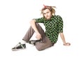 Young dreadlock man sits isolated Royalty Free Stock Photo