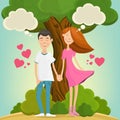 Young dreaming couple in love near tree