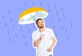 Young dreaming man standing with drawn lemon umbrella on blue background. Collage in magazine style. Flyer with trendy Royalty Free Stock Photo