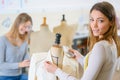 young dressmaker looking at camera