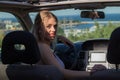 Young driver woman behind steering wheel Royalty Free Stock Photo