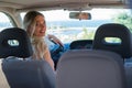 Young driver woman behind steering wheel Royalty Free Stock Photo