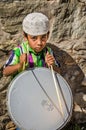 Young drummer boy at muslim festival