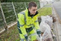 Young dustman cleans streets