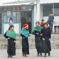 Young Ecuadorian indigenous schoolgirls at a schoolyard