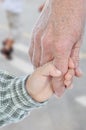 Young and elderly hands, outdoor