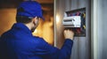 A Young Electrician\'s Expertise in Disassembling a House\'s Electrical Panel. Generative AI Royalty Free Stock Photo