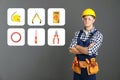 Young electrician and tools and background Royalty Free Stock Photo