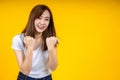 Young elegant Asian woman smiling and expressing a very happy Royalty Free Stock Photo