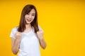 Young elegant Asian woman smiling and expressing a very happy Royalty Free Stock Photo