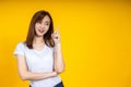 Young elegant Asian woman smiling and pointing to empty copy space Royalty Free Stock Photo