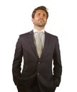 Young elegant and handsome businessman in suit and tie posing for company corporate portrait relaxed and confident isolated on wh Royalty Free Stock Photo