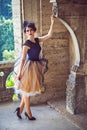 Young elegant lady on the balcony of the castle Royalty Free Stock Photo