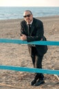 A young elegant man is on the beach. Ardea. Italy. Royalty Free Stock Photo