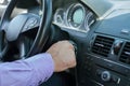 Young elegant man is starting his car Royalty Free Stock Photo