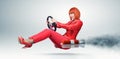 Young elegant woman in red driver car with a wheel Royalty Free Stock Photo