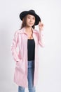Woman portrait in a trendy pink coat Royalty Free Stock Photo