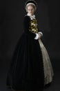 A young Elizabethan woman in a black velvet dress Royalty Free Stock Photo