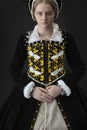 A young Elizabethan woman in a black velvet dress Royalty Free Stock Photo