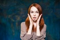 Young emotional redhead girl shout with hands near mouth Royalty Free Stock Photo