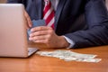 Young male employee playing cards at workplace Royalty Free Stock Photo