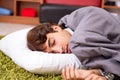 The young employee sleeping on the floor at office Royalty Free Stock Photo